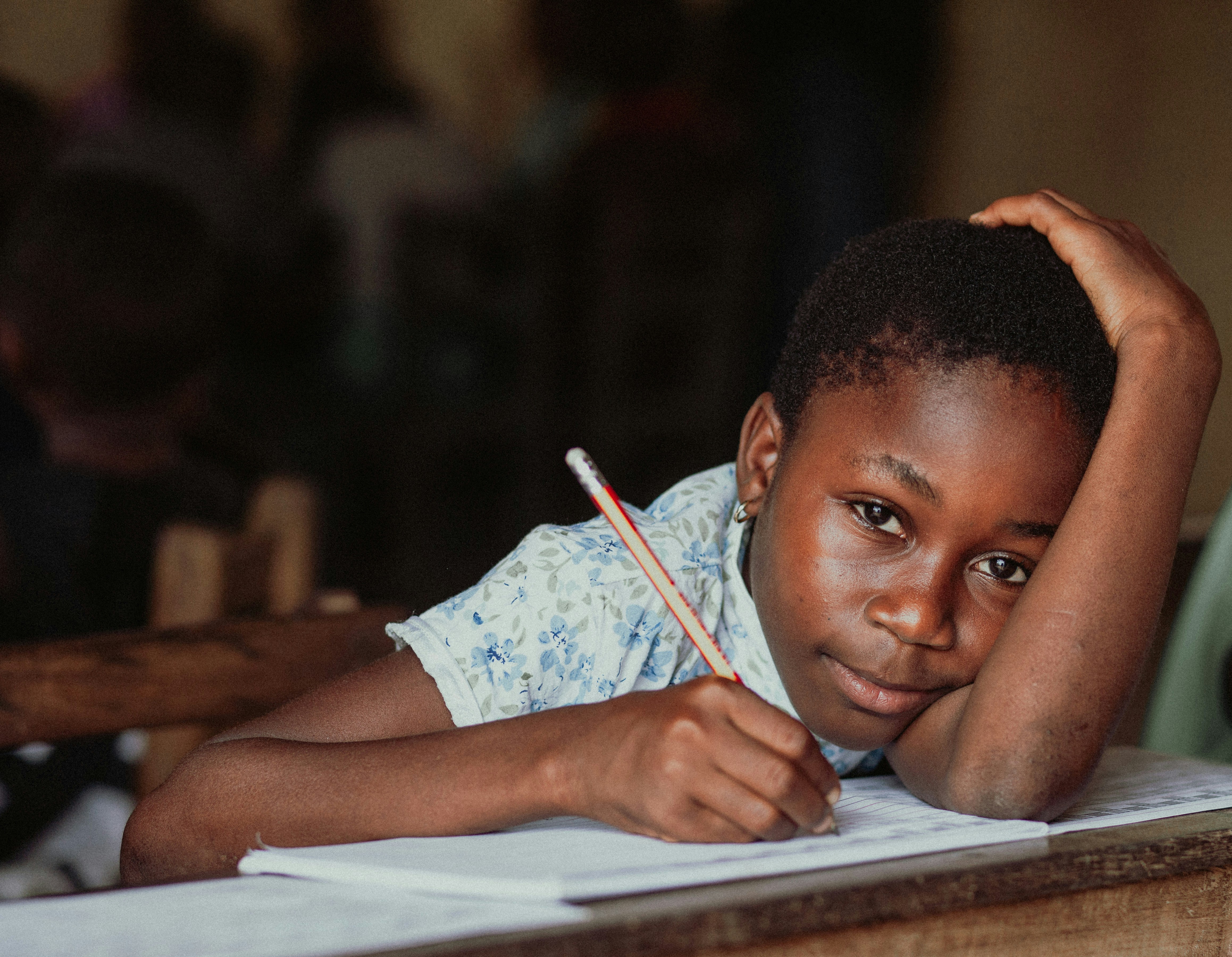 Student writing in class